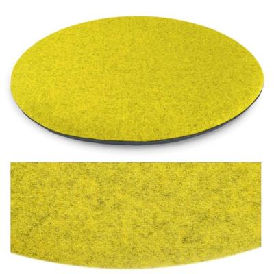 Das foto zeigt eine runde sitzauflage der firma discus. Die farbe der sitzauflage ist  gelb  meliert.