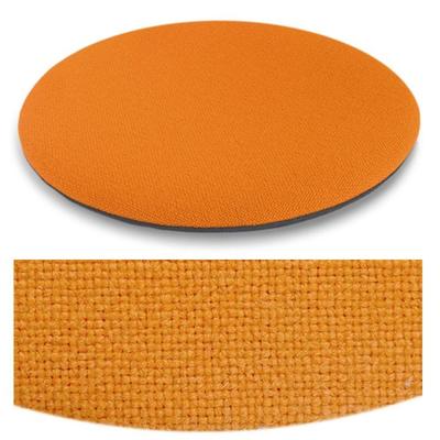 Das foto zeigt eine runde sitzauflage der firma discus. Die farbe der sitzauflage ist  orange.