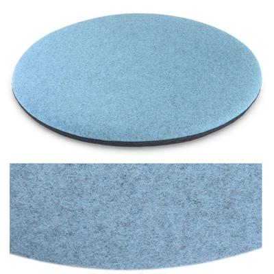 Das foto zeigt eine runde sitzauflage der firma discus. Die farbe der sitzauflage ist  hellblau meliert.