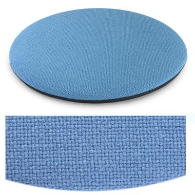 Das foto zeigt eine runde sitzauflage der firma discus. Die farbe der sitzauflage ist  hellblau.