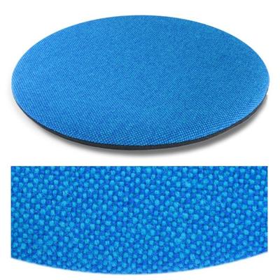 Das foto zeigt eine runde sitzauflage der firma discus. Die farbe der sitzauflage ist  blau-tuerkis meliert.