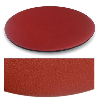 Das foto zeigt eine runde sitzauflage der firma discus. Die farbe der sitzauflage ist  rot.